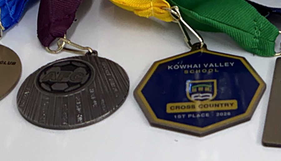 Sport and event medals on colour ribbons